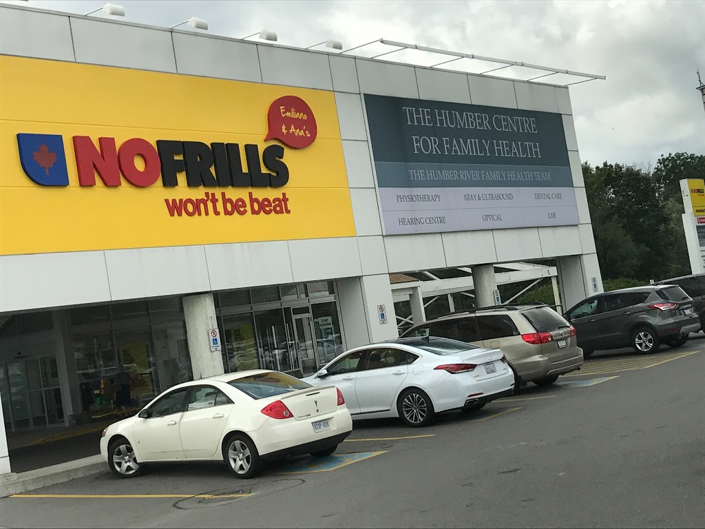 Emiliano and Anas No Frills | 245 Dixon Rd, Etobicoke, ON M9P 2M4, Canada | Phone: (866) 987-6453