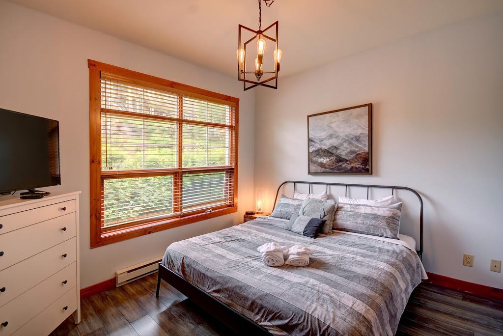 Les Eaux 225-1 by Escapades Tremblant | 1-225 Chemin des Quatre-Sommets, Mont-Tremblant, QC J8E 1C6, Canada | Phone: (877) 352-6626