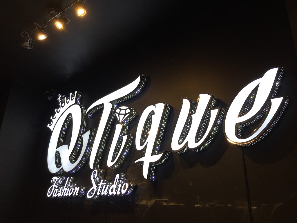 Q-tique Fashion Studio | 1020 Barrington St, Halifax, NS B3H 2P9, Canada | Phone: (902) 406-0338