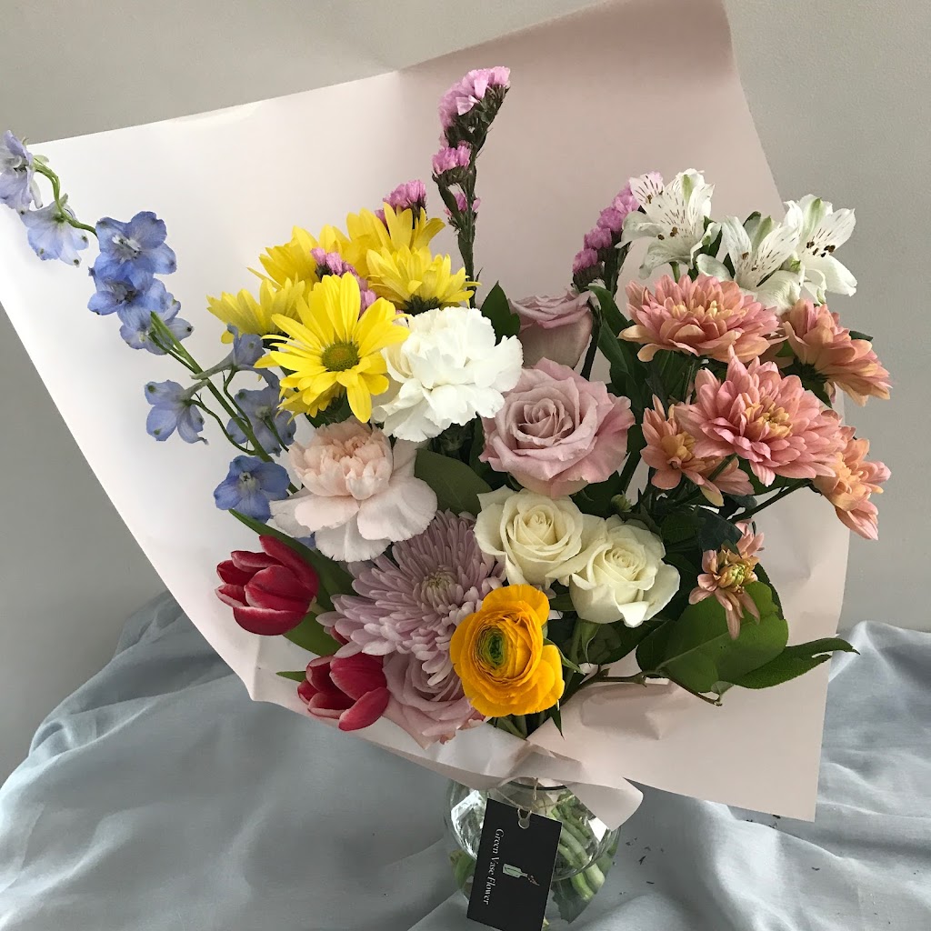 Green vase Flower | 46 Aspen Stone Manor SW, Calgary, AB T3H 0H3, Canada | Phone: (403) 870-6557