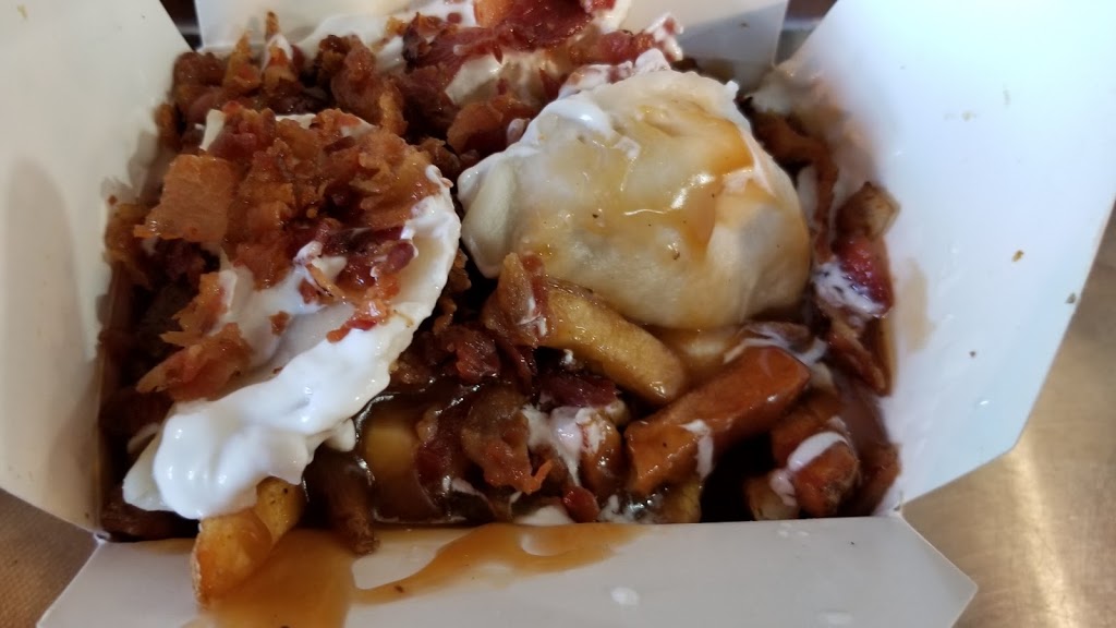 Smokes Poutinerie | 400-855 Regent Ave W #400, Winnipeg, MB R2C 0R1, Canada | Phone: (204) 255-2873