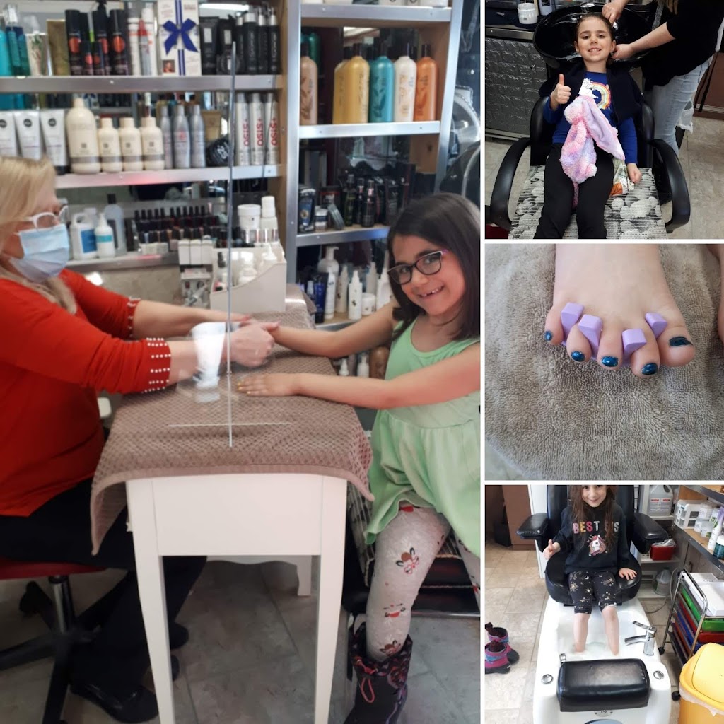 Fusion 2000 Coiffure Inc | 1354 Rue Sauvé E, Montréal, QC H2C 2A2, Canada | Phone: (514) 389-7315