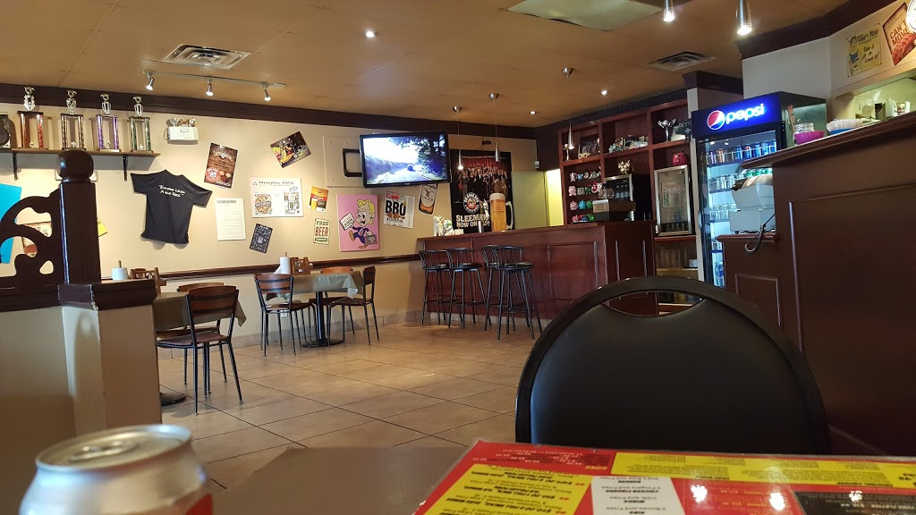 Big Bone BBQ and Wicked Wings | 190 Minets Point Rd, Barrie, ON L4N 4C3, Canada | Phone: (705) 733-2663