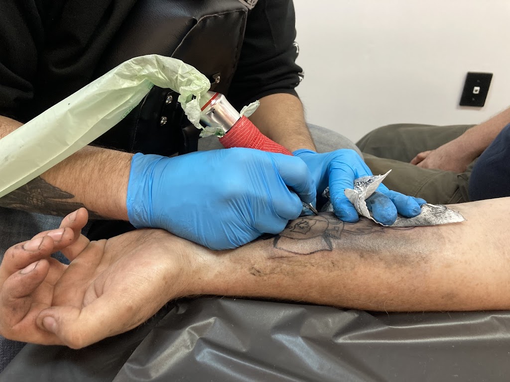Redline tattoo | 5009d 51 St, Barrhead, AB T7N 1B8, Canada | Phone: (780) 674-0585