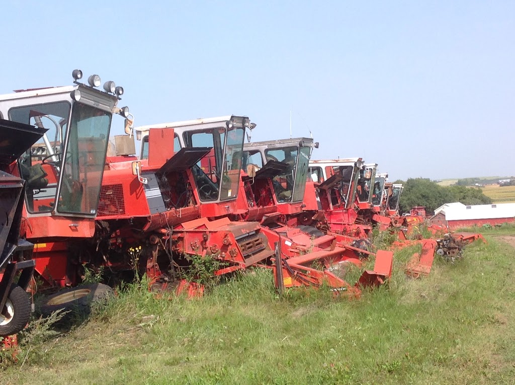 Loeffelholz Tractor & Combine Salvage | Farm Box 367, Cudworth, SK S0K 1B0, Canada | Phone: (306) 256-7107