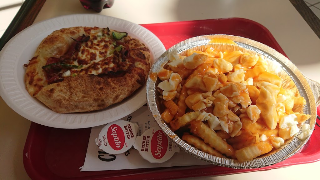 Chez Louis Poulet Et Pizza | 755 Boulevard René-Lévesque local 205, Drummondville, QC J2C 2A8, Canada | Phone: (819) 850-8974