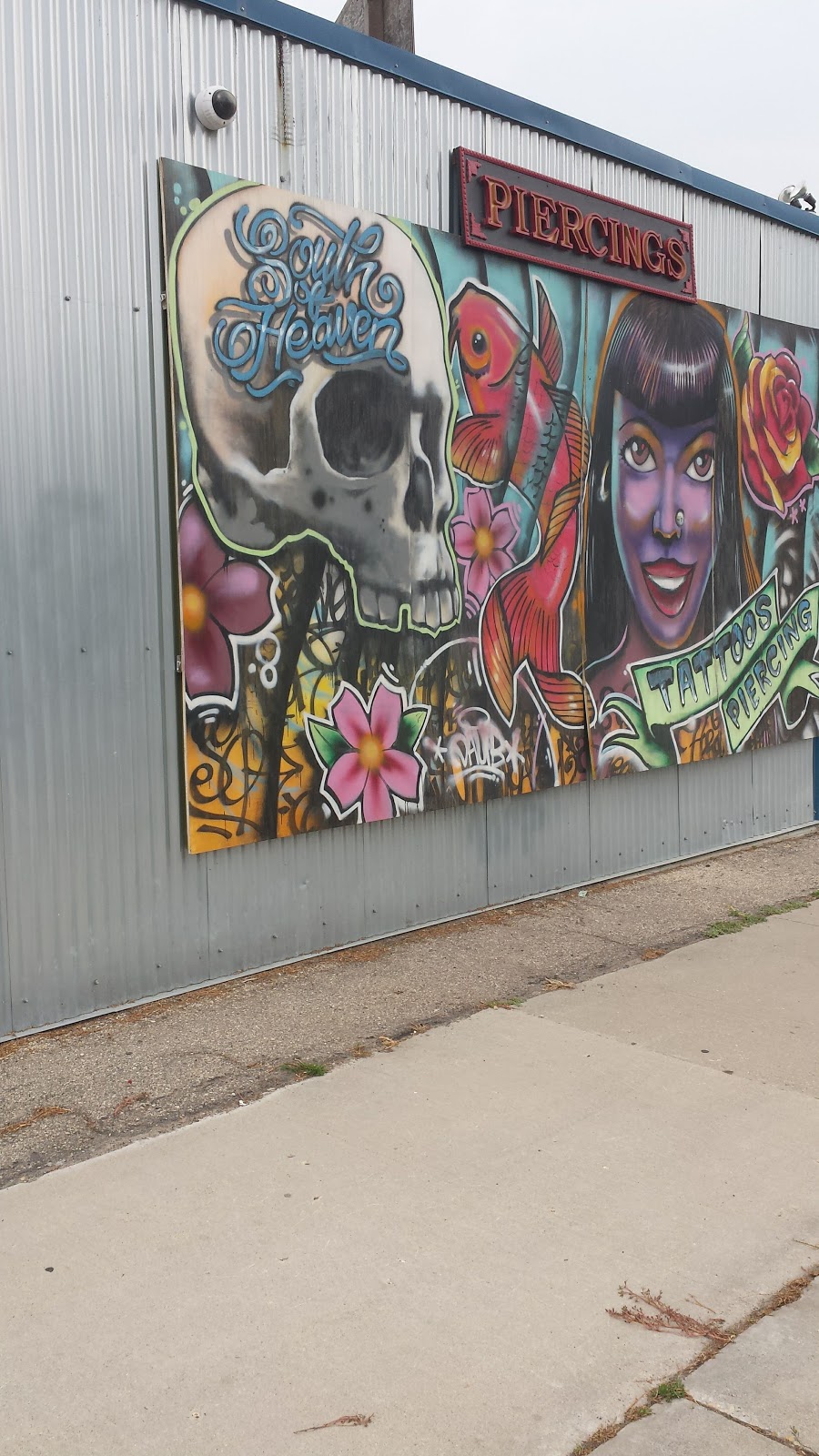 South Of Heaven Tattoos & Body Piercing | 972 St Marys Rd, Winnipeg, MB R2M 3R8, Canada | Phone: (204) 254-8054