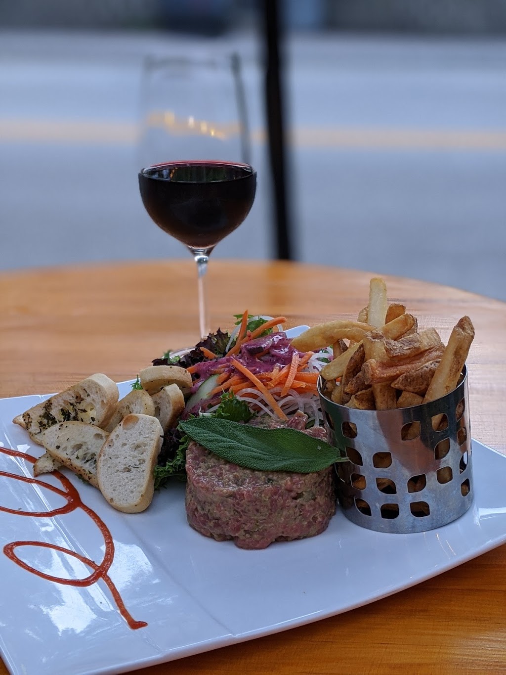 LOrange Bistro | 29 Rue Ambroise Fafard, Baie-Saint-Paul, QC G3Z 2J2, Canada | Phone: (418) 240-1197