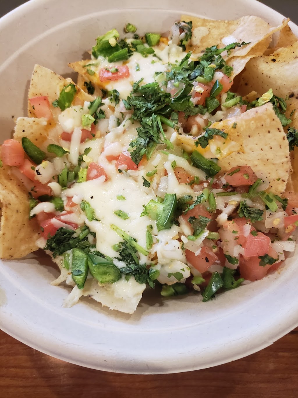 Mucho Burrito Fresh Mexican Grill | 223 North Service Rd W, Oakville, ON L6M 2G2, Canada | Phone: (905) 338-2002