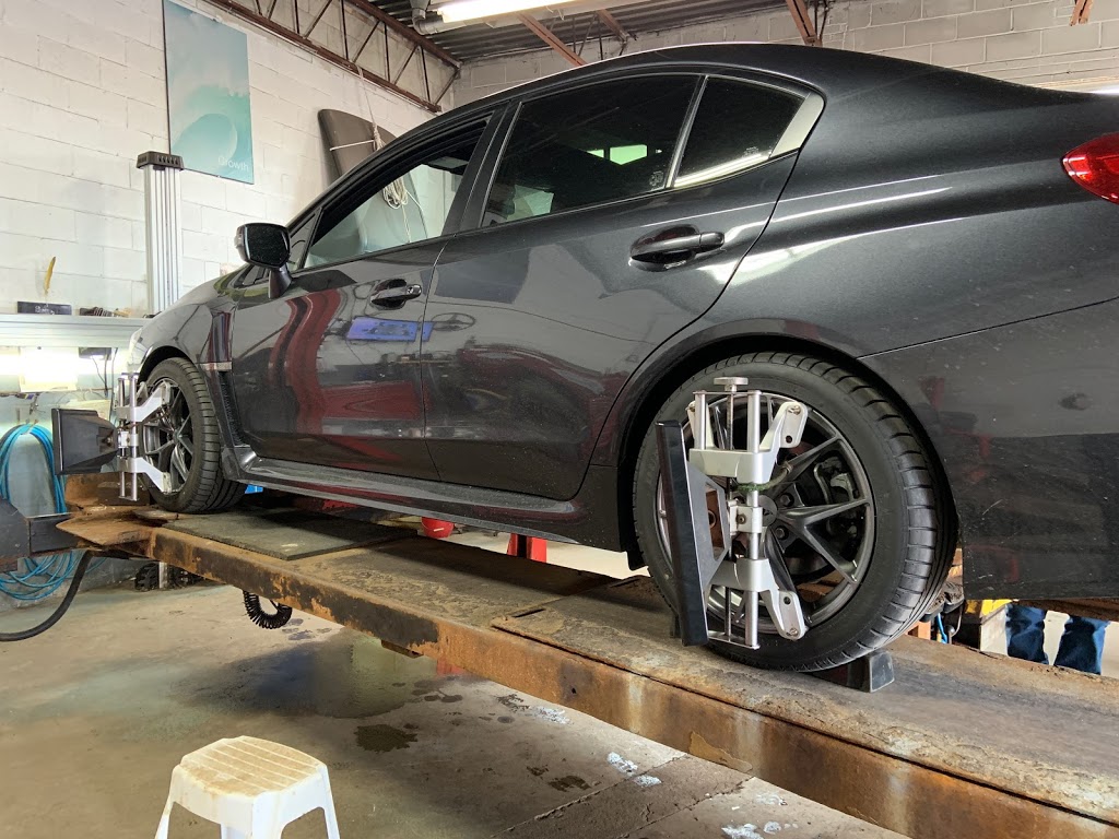 Just Alignment and Tire Centre | 155 Milvan Dr Unit #3 (at the BACK of the Building, North York, ON M9L 1Z8, Canada | Phone: (416) 744-9120