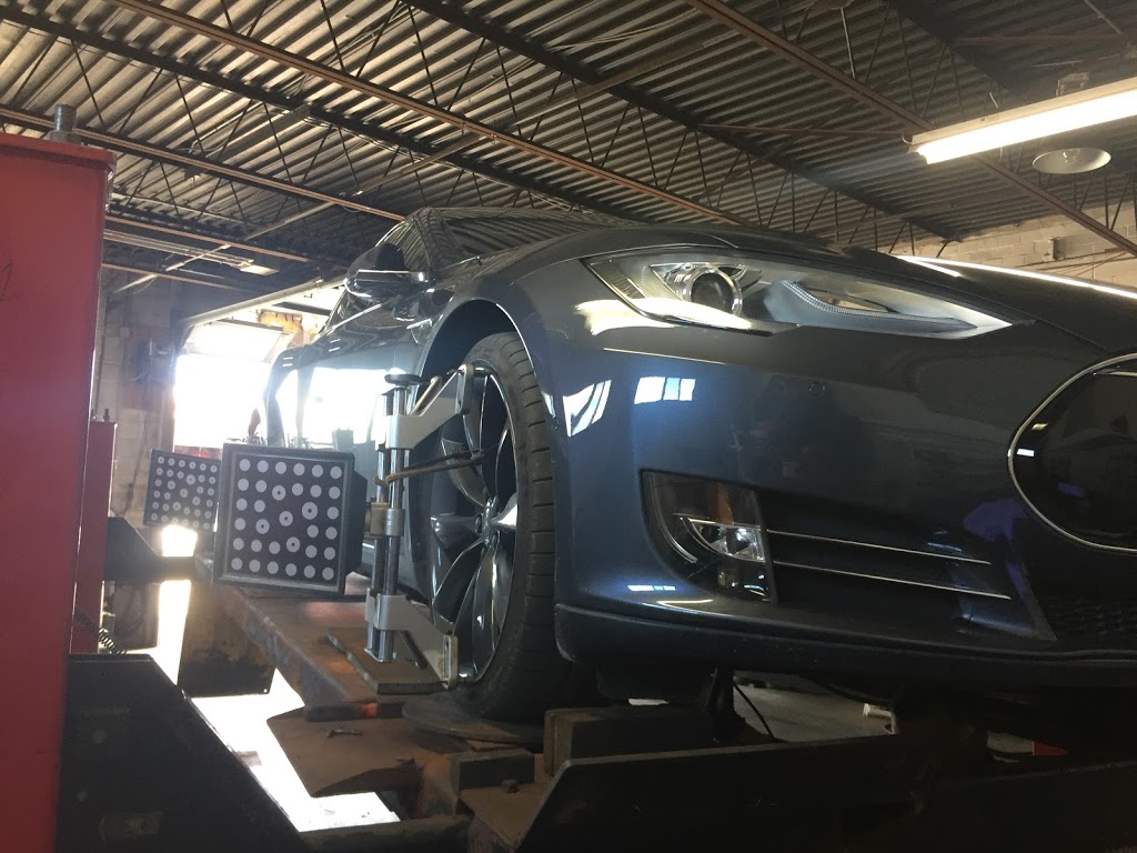 Just Alignment and Tire Centre | 155 Milvan Dr Unit #3 (at the BACK of the Building, North York, ON M9L 1Z8, Canada | Phone: (416) 744-9120