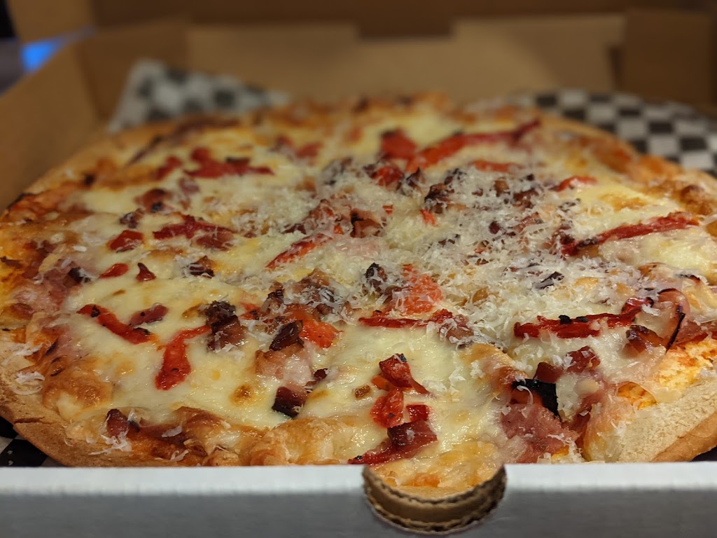 Pink Door Pizza | 4307 130 Ave SE #180, Calgary, AB T2Z 3V8, Canada | Phone: (403) 764-7465