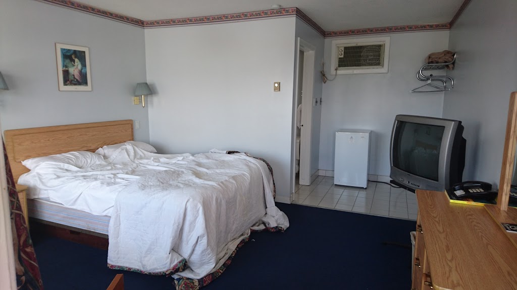 Milan Garden Inn | 13055 Lundys Ln, Niagara Falls, ON L2E 6S4, Canada | Phone: (905) 227-0891