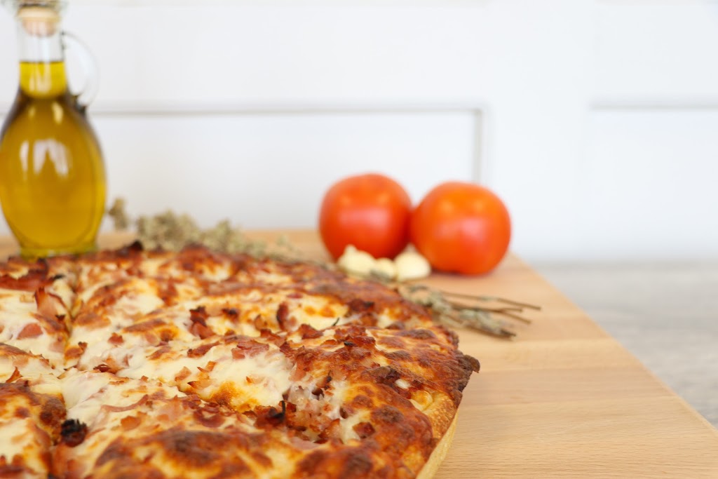 Bow Tie Pizza (Centre St) | 4817b Centre St N, Calgary, AB T2E 2Z6, Canada | Phone: (403) 299-0000