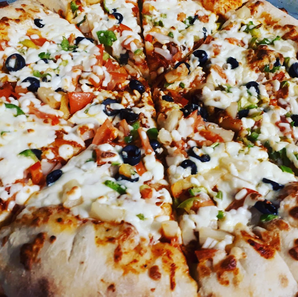 Unclez Charlie Pizza | 644 McPhillips St, Winnipeg, MB R2X 2H2, Canada | Phone: (204) 306-6500