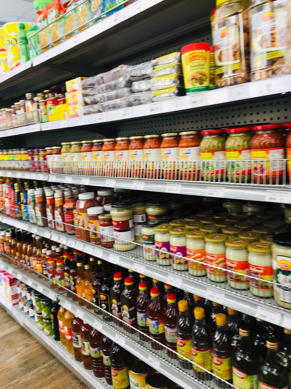 Poojas Kinnimart | 288 Kinniburgh Blvd #106, Chestermere, AB T1X 0V8, Canada | Phone: (587) 885-3133