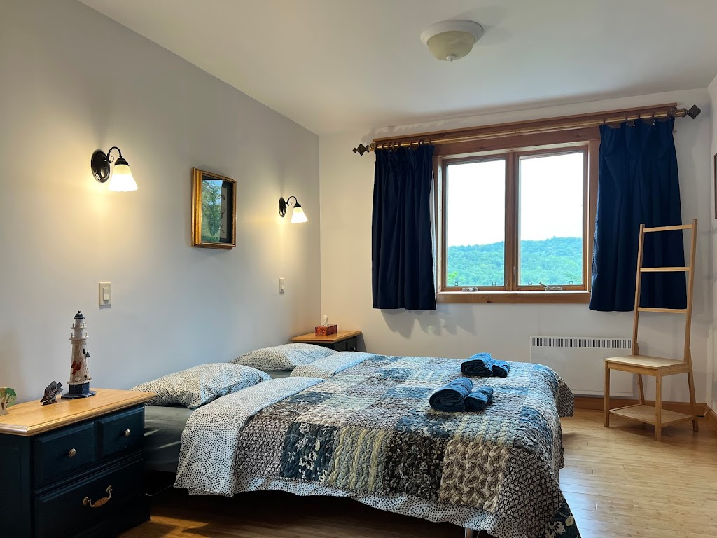 Forest bed and breakfast with river rest area | 6289 Rte Principale, Wentworth-Nord, QC J0T 1Y0, Canada | Phone: (647) 870-4400