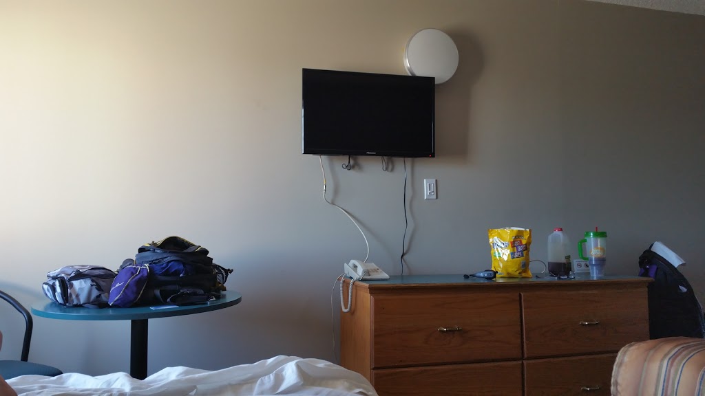 Airport Travellers Inn Hotel | 1808 19 St NE, Calgary, AB T2E 4Y3, Canada | Phone: (800) 661-8164