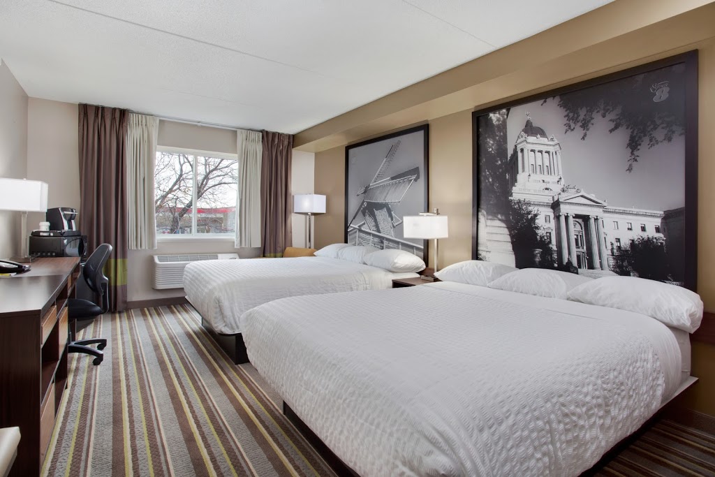 Super 8 by Wyndham Winnipeg West | 3760 Portage Ave, Winnipeg, MB R3K 1A1, Canada | Phone: (204) 831-9800