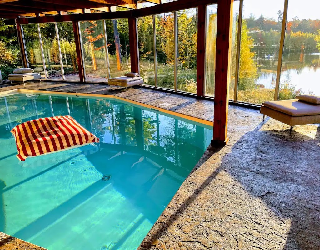 Chalet by the Lake with Indoor Pool | 3 Chem. des Papillons, Sainte-Anne-des-Lacs, QC J0R 1B0, Canada | Phone: (647) 879-1986
