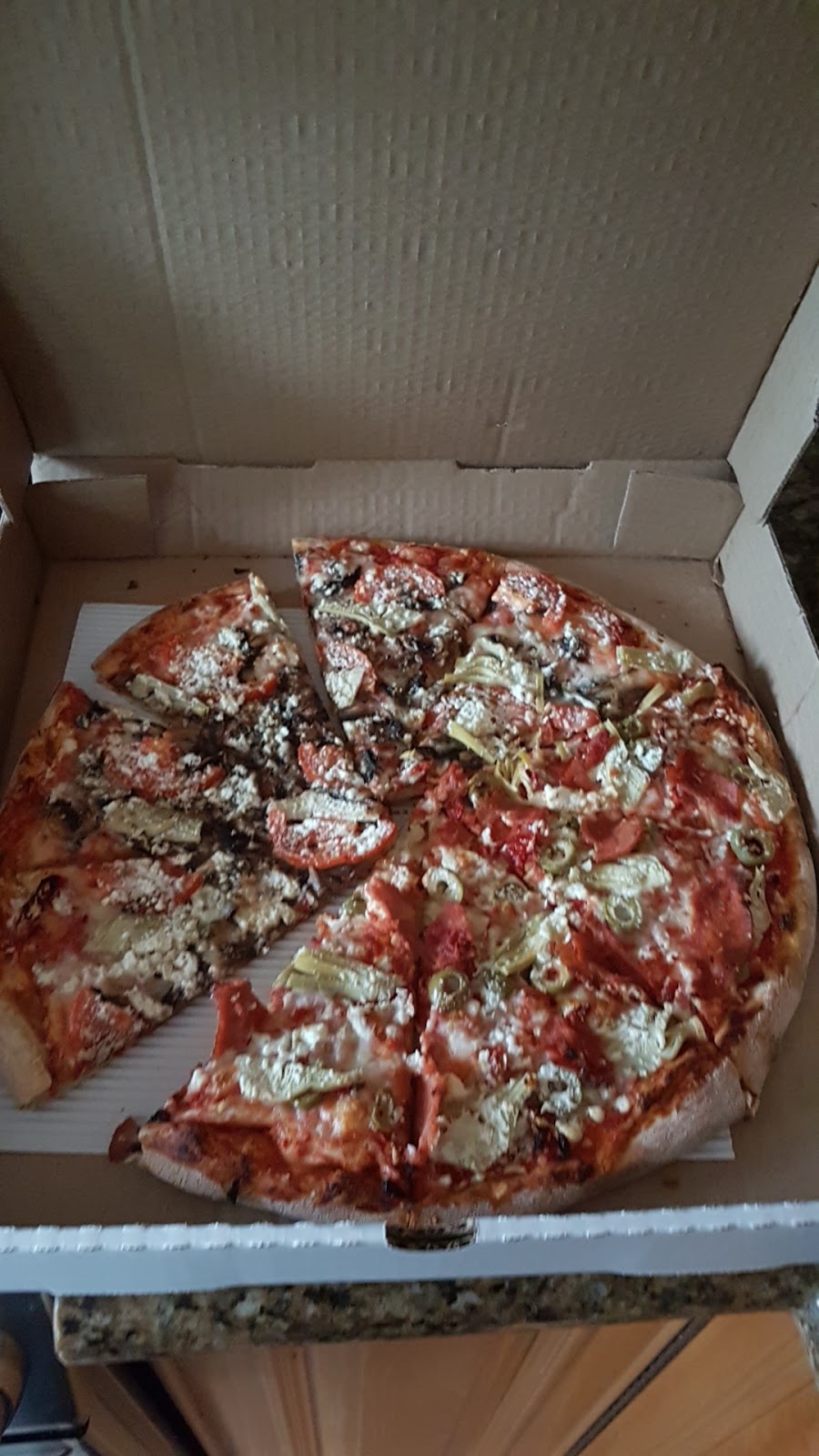Mokis Pizza | 5530 Dunbar St, Vancouver, BC V6N 1W6, Canada | Phone: (604) 263-4440