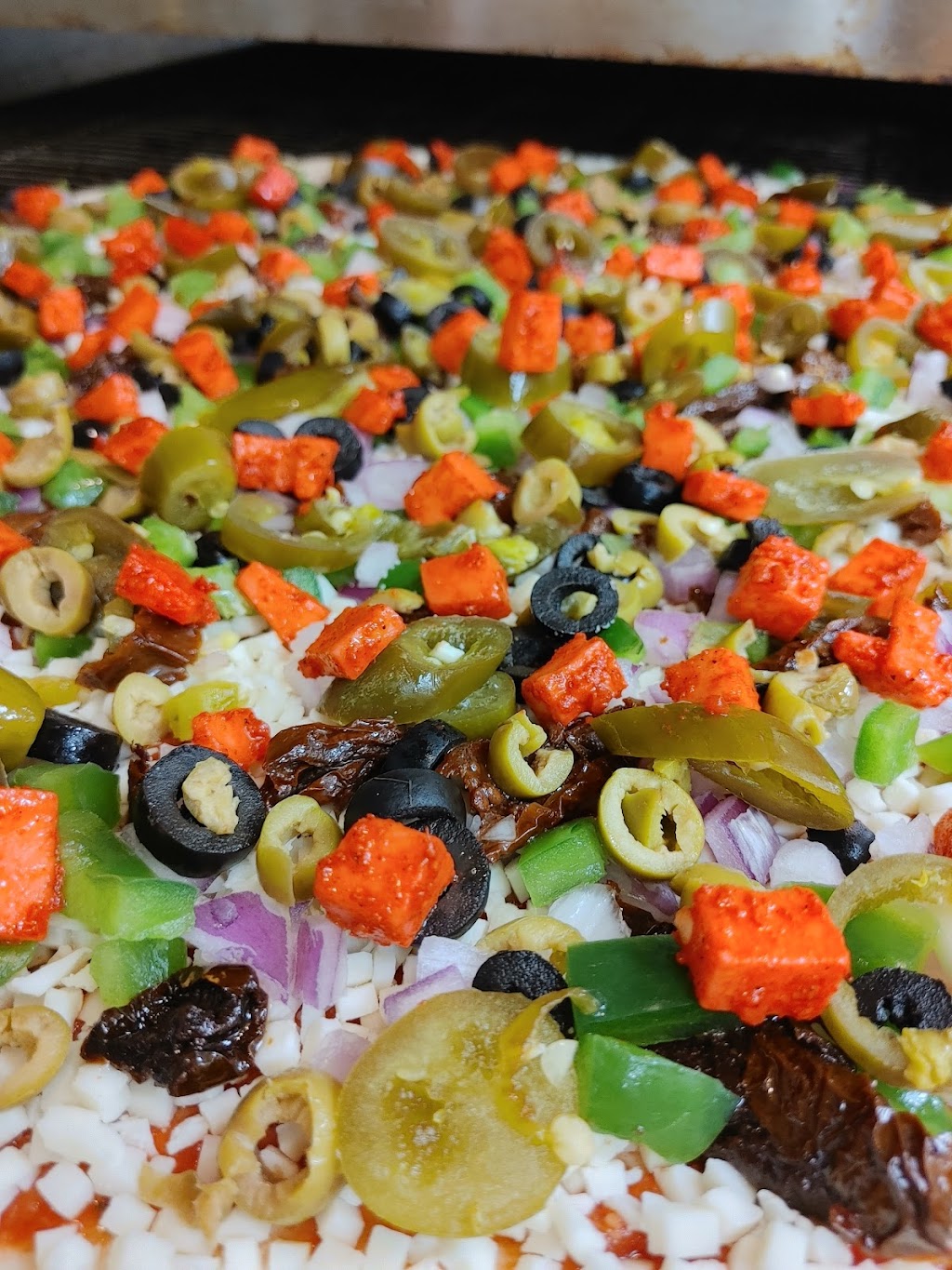 Ginos Pizza | 5025 Heatherleigh Ave Unit 4, Mississauga, ON L5V 2Y7, Canada | Phone: (905) 502-0111