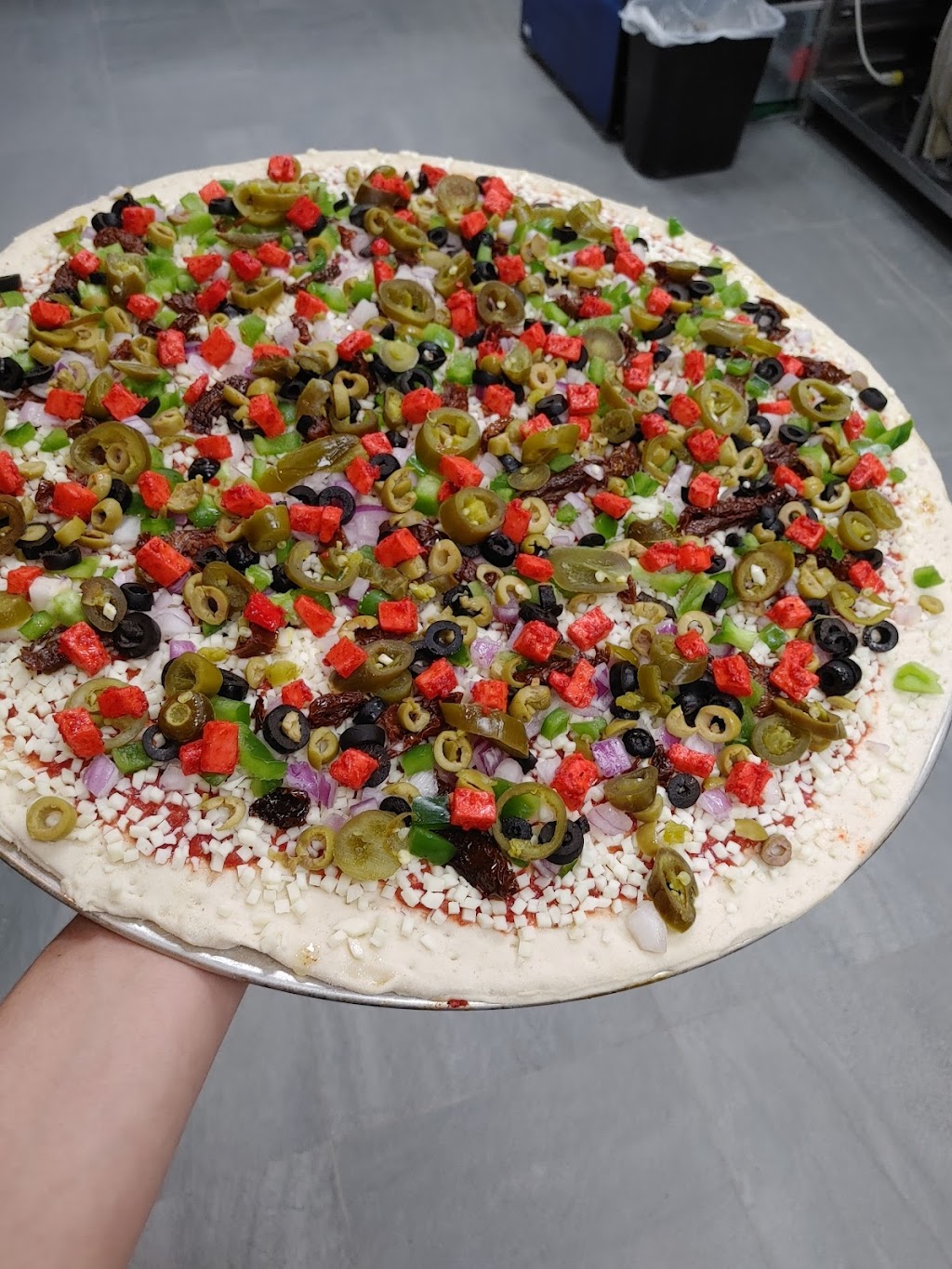 Ginos Pizza | 5025 Heatherleigh Ave Unit 4, Mississauga, ON L5V 2Y7, Canada | Phone: (905) 502-0111