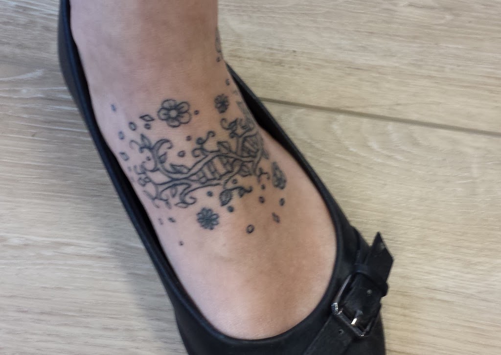 Buzzz Tattoo | 1530 9 Ave SE, Calgary, AB T2G 0T7, Canada
