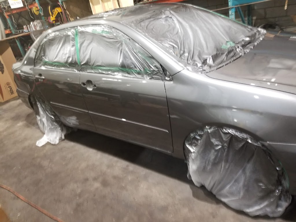 road service carrosserie haji akram | 3844 Boulevard Lévesque O, Laval, QC H7V 1E8, Canada | Phone: (514) 549-2305