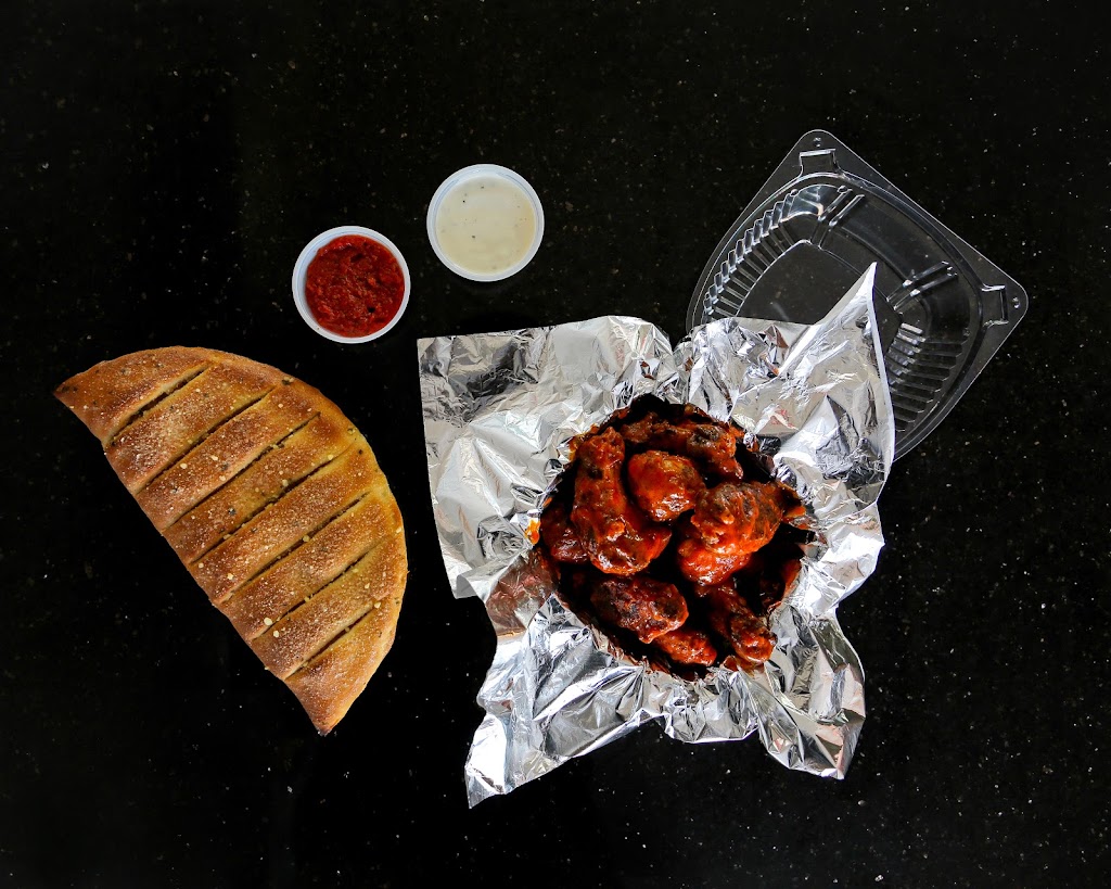 Villages Pizza | 3967 17 Ave SW, Calgary, AB T3E 0C3, Canada | Phone: (403) 217-3777