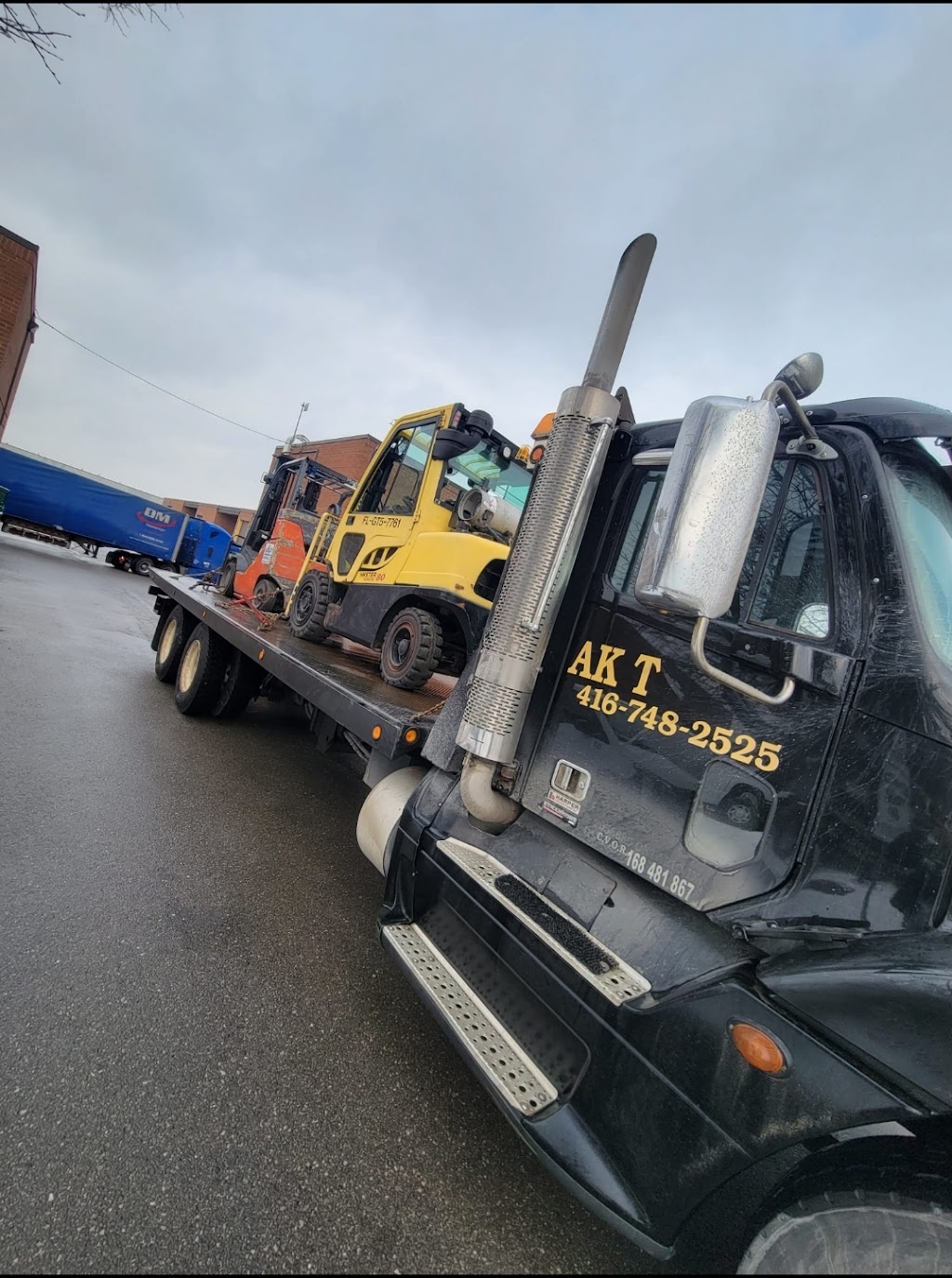 AK TOWING & MACHINERY MOVERS | 205 Toryork Dr, North York, ON M9L 1Y2, Canada | Phone: (416) 748-2525